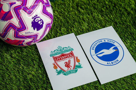 Liverpool vs. Brighton & Hove Albion Premier League match, official soccer ball on green grass, wallpaper with edit space.