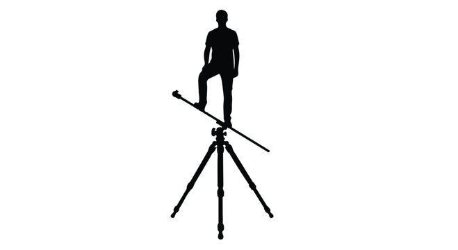 Silhouette of a person standing precariously on a tripod