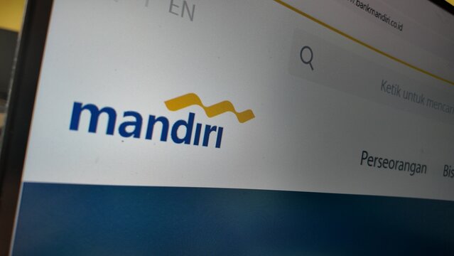 a computer screen with mandiri website displayed