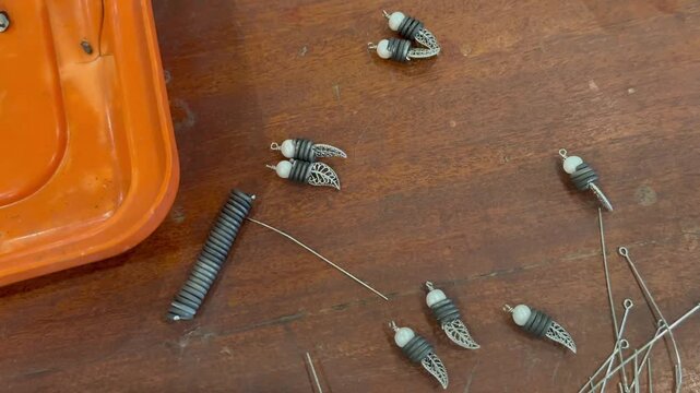 Almost finished jewelry on the table in a small workshop in Zambia.