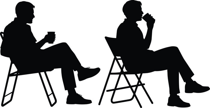 Silhouette of two men sitting on chairs drinking coffee, relax side view profile, male friends talking and having tea break.