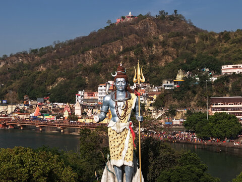 Lord Shiva Statue with Mansa Devi Temple Background, Haridwar