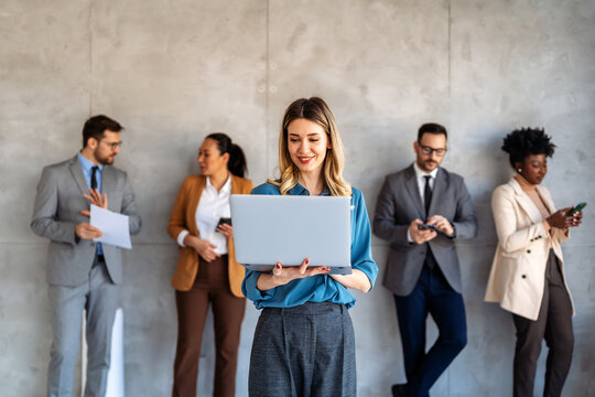 Successful executive standing proudly in office, representing business growth, partnership