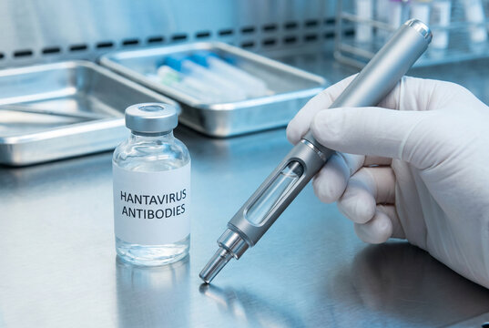 Hantavirus antibodies vial alongside autoinjector pen on laboratory tray