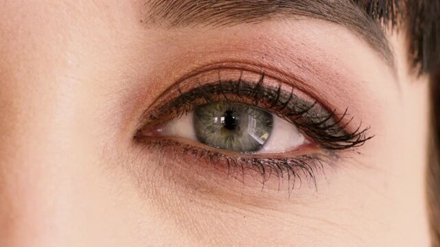 Health, eye and woman with optometry in closeup for eyesight test, ocular cosmetics or wellness. Makeup, eyecare and face of person with glaucoma exam, contact lenses and prescription for cataracts