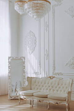 Luxury Classic Interior with Elegant White Sofa and Chandelier