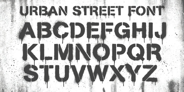 Urban street graffiti font with black spray paint letters on a concrete wall texture