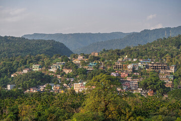 Fototapeta premium Scenic landscape view of border town in Meghalaya hills of India seen from Jaflong Zero Point, Sylhet, Bangladesh