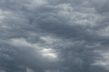 Fototapeta premium Dramatic dark sky. Heavy gray clouds background