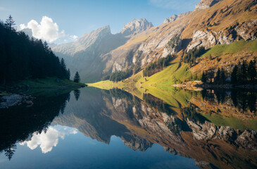 Naklejka premium Switzerland alpine mountain scenery at Seealpsee lake, Appenzellerland, Switzerland 