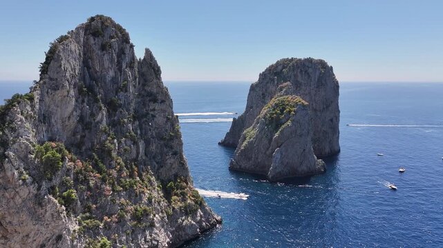 Faraglioni Of Capri At Naples In Campania Italy. Coastal Landscape. Waterfront Scene. Faraglioni Of Capri At Naples In Campania Italy. Beach Scenery. Paradisiac Seafront. Capri Island Skyline.