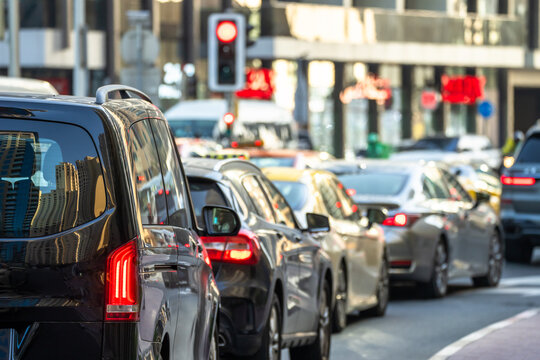 Heavy urban traffic congestion during weekday rush hours, with long queues of vehicles, illustrating commuting delays, city infrastructure pressure, and daily transportation challenges.