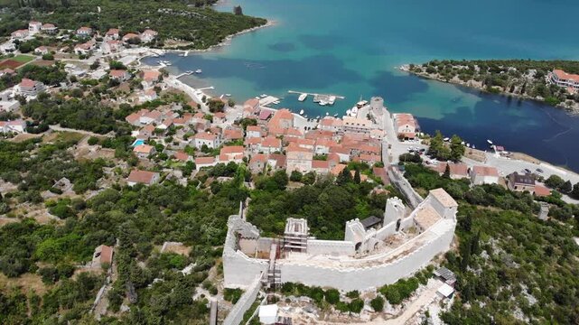Croatia drone view. Mali Ston Bay (Malostonski Zaljev) of Adriatic Sea. Fortified town walls.