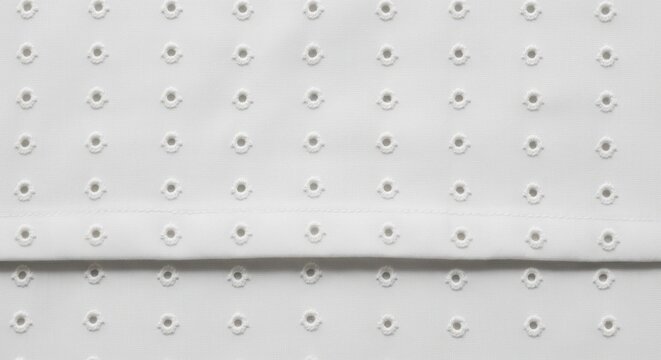 white paper with embossed circular pattern for packaging and document design