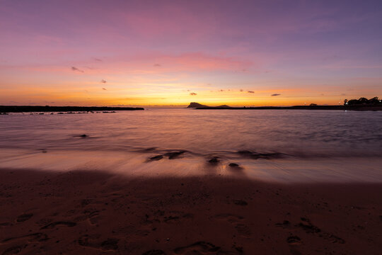 A beautiful sunset full of colors on Murdeira Beach, which is a quiet, scenic sandy and rocky cove located on the sheltered west coast of Sal Island, Cape Verde. The beach is located inside a protecte