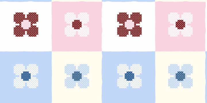 Cross stitch floral pattern on a checkered pastel background featuring pink and blue squares