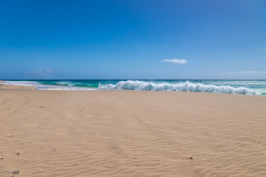 The beautiful beach of Ponta Preta (English translation: Black Beack) is a tranquil part of Sal Island in Cape Verde without many tourists but with a perfect golden sand beach and turqiouse water crea