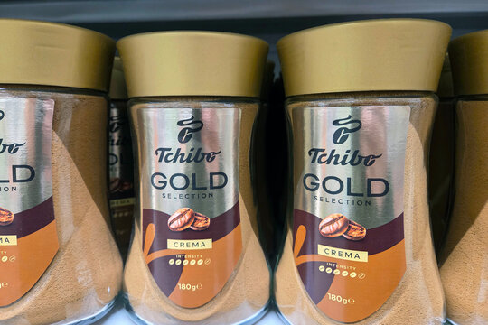 Wroclaw, Poland, April 29, 2026: Tchibo Gold Crema Instant Coffee Jars on Store Shelf for Premium Beverage Selection