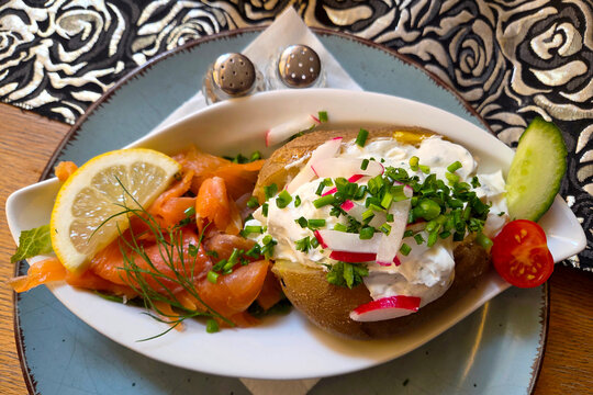Gourmet Baked Potato with Smoked Salmon and Fresh Herbs for Culinary Delight