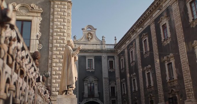 View of the back of Cathedral of Saint Agatha in Catania, Sicily, statue, 4k