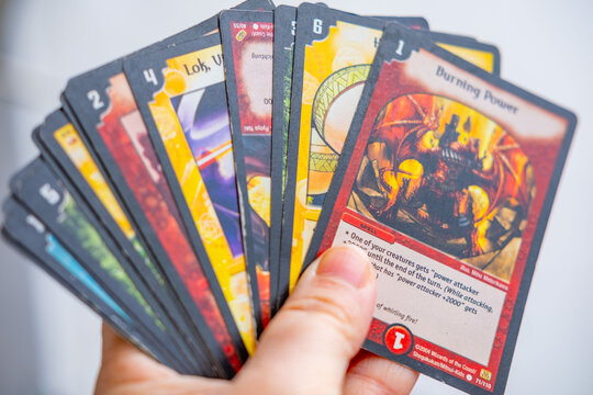 German version Duel Masters trading cards spread out, German language cards feature fantasy creatures, Aqua-Wache and Lena Vizier cards, nostalgic collectible game, Wizards Coast, playful pop culture