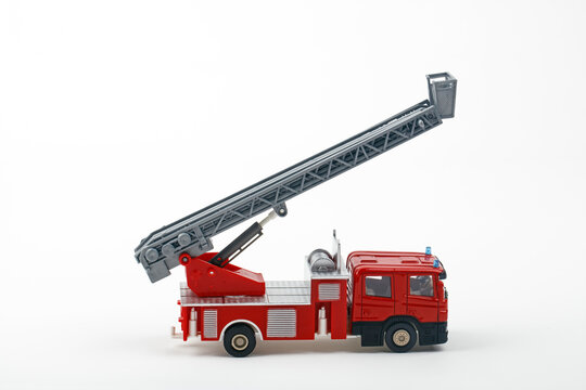 Red firetruck toy with large ladder