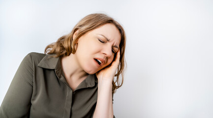 Obraz na płótnie Canvas Woman feeling sharp toothache holding cheek. Dental health concept. Stomatology emergency gingivitis sensitive teeth.