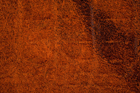 Brown exotic leather texture close up with suede reptile underside and natural matte surface
