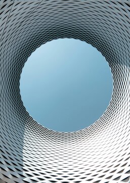 Modern futuristic architecture featuring circular skylight opening to blue sky offers a striking abstract background for innovative engineering and design campaigns.