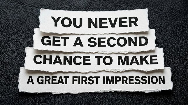 White paper strips featuring bold black text stating you never get a second chance to make a great first impression