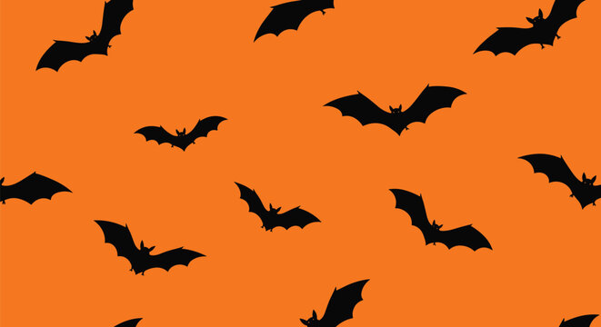 Spooky seamless pattern of black bat silhouettes flying in various directions across a vibrant orange background.
