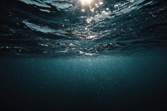 Underwater Sunlight Rays Penetrating Deep Blue Ocean Water.