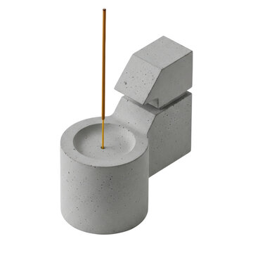 Concrete incense burner with joss stick cutout on transparent background