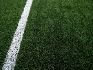 Fototapeta premium Vibrant Green Soccer Field Grass with White Line