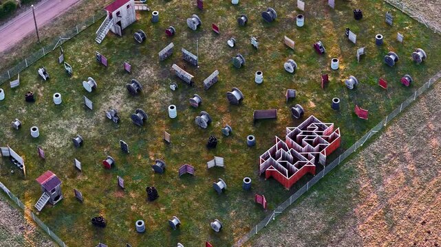 Paintball or lazer tag field showing game activity, obstacles and maze with multiple bunkers