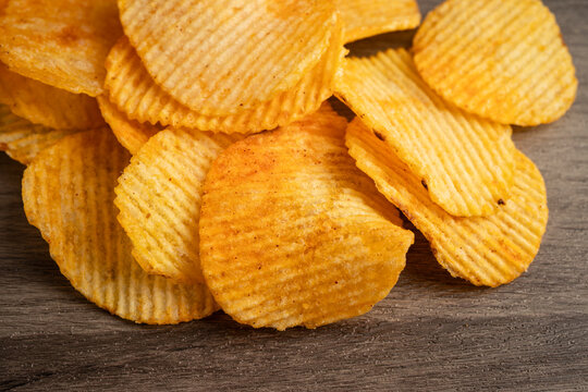 Potato chips , delicious BBQ seasoning spicy for crips, thin slice deep fried snack fast food.