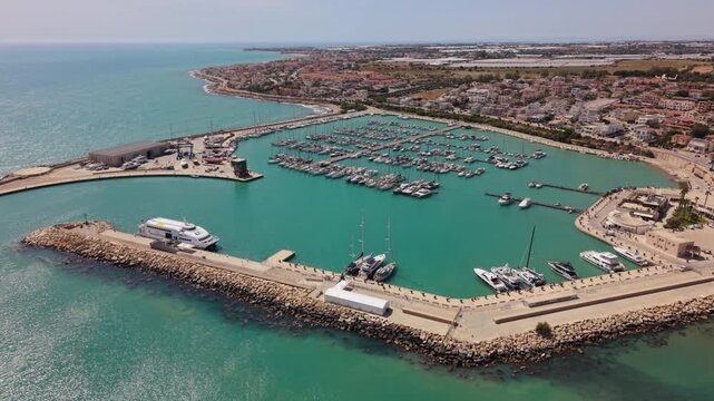flying clockwise around boats at Marina di Ragusa in Sicily