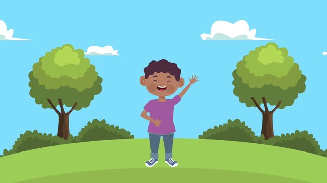 Young boy waving hello in a park with trees and blue sky.