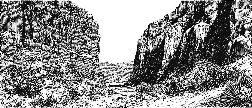 Deep rocky canyon with steep cliffs and rugged terrain in a natural wilderness landscape