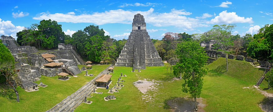 Tikal Great Plaza panorama with Grand Jaguar temple pyramid and acropolis, Tikal national park, Guatemala.