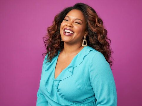 Brown skinned curvy woman portrait beauty radiant magenta background thirties caramel turquoise blouse front joyful smile showing self love energy for wellness fashion advertising diversity
