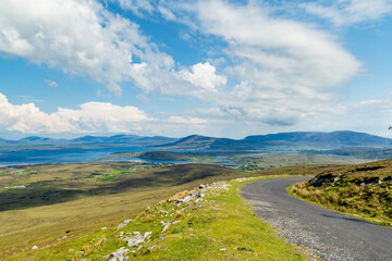 Obraz premium Mountain view from Minaun Heights on Achill Island, County Mayo, Ireland. Scenic rocky summit landscape above clouds, coast and Atlantic islands.