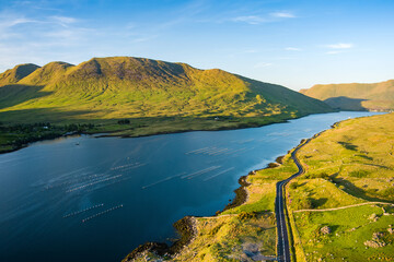 Obraz premium Aerial view of Killary Fjord near Leenane on the Galway Mayo border, Ireland. Irelands only fjord winds through the dramatic Connemara and Mayo mountain landscape.