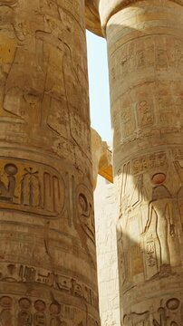 Karnak Temple in Luxor, Egypt. The ancient ruins of a majestic Egyptian temple from the time of the Pharaohs. The history of Egypt. Vertical video.