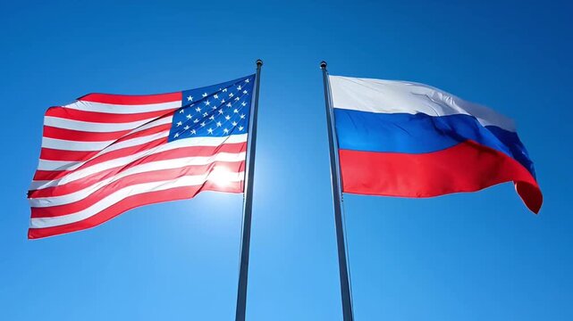 concept 3d render of united states and russia flags waving against a bright sun and blue sky symbolizing international relations and political agenda of two major world powers