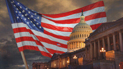  US Capitol building at night with an American flag in the background, Washington DC, USA. Happy 4th of July – Independence Day! © Igor