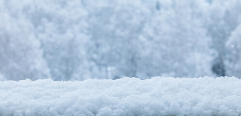 Winter background for product. Snow accumulation covering flat surface during falling snowflake