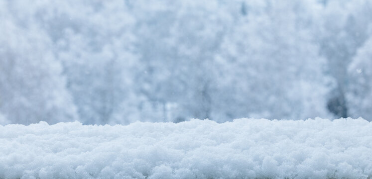 Winter background for product. Snow accumulation covering flat surface during falling snowflake