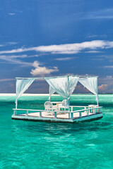 Obraz premium Maldives. Paradise tropical beach. Travel, tourism and relaxation in the luxury resort. The best place for a romantic holiday and wellness