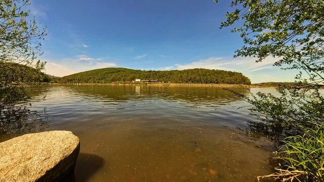 4K Timelapse video with moving clouds and reflections at Lake Drachensee, Furth im Wald, Cham, Bavarian Forest, Bavaria, Germany